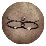 Geknoopt armbandje met kattenkopje wit of antractiet gemarmerd