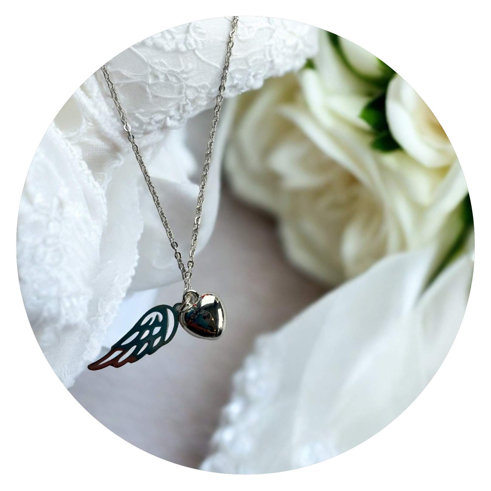 Ketting hartje met vleugeltje Ketting hartje met vleugeltje