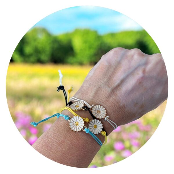 Set vier veterarmbandjes met bloem