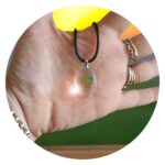 Veterketting met ovalen hanger met echt klavertje vier