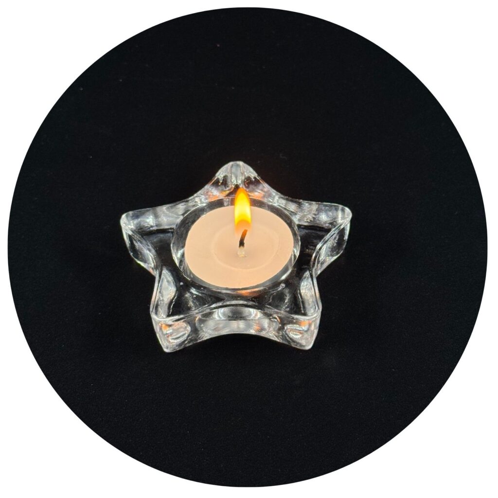 Glazen ster met waxinelichtje